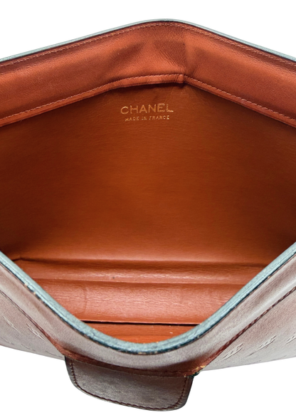 CHANEL CC EMBOSSED CLUTCH