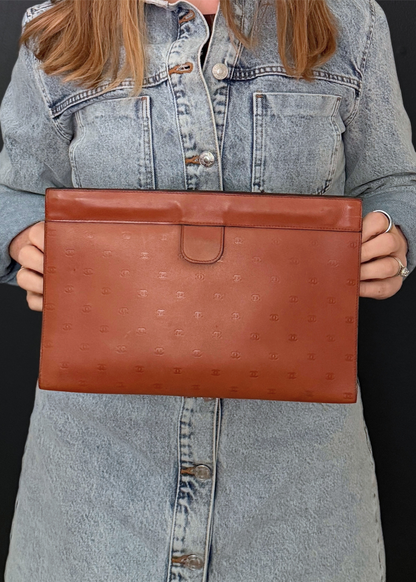 CHANEL CC EMBOSSED CLUTCH
