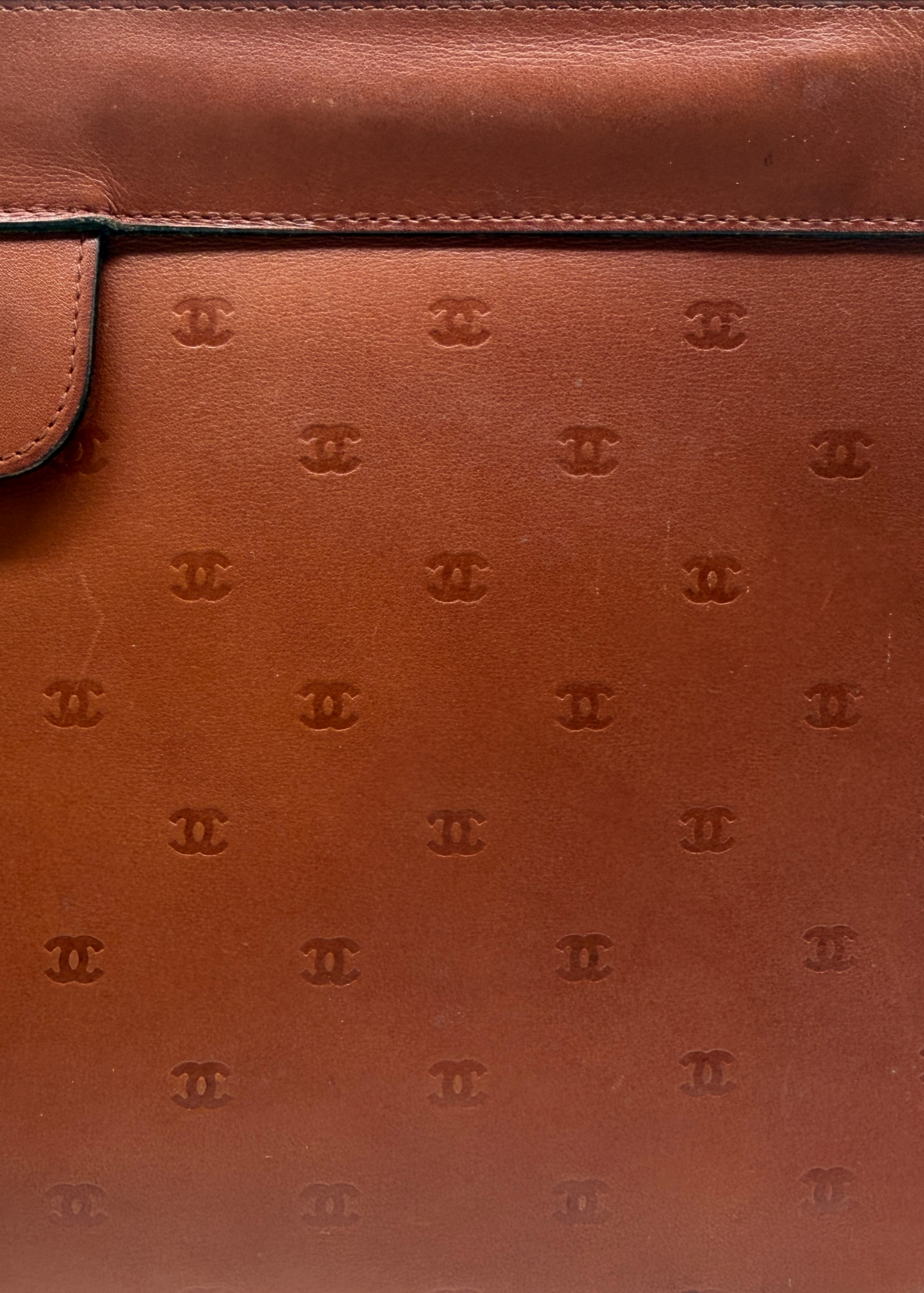 CHANEL CC EMBOSSED CLUTCH