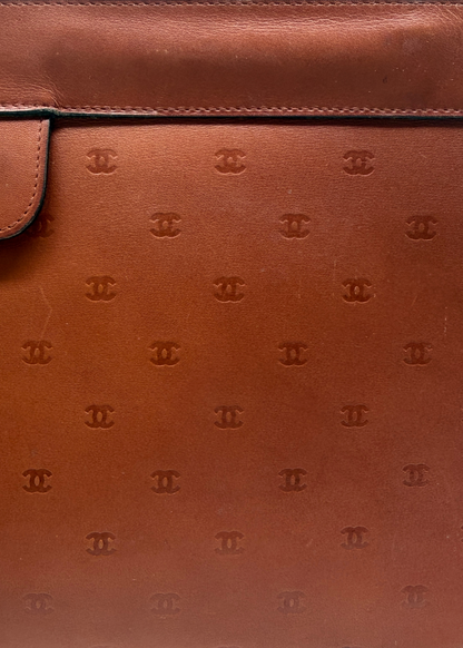 CHANEL CC EMBOSSED CLUTCH