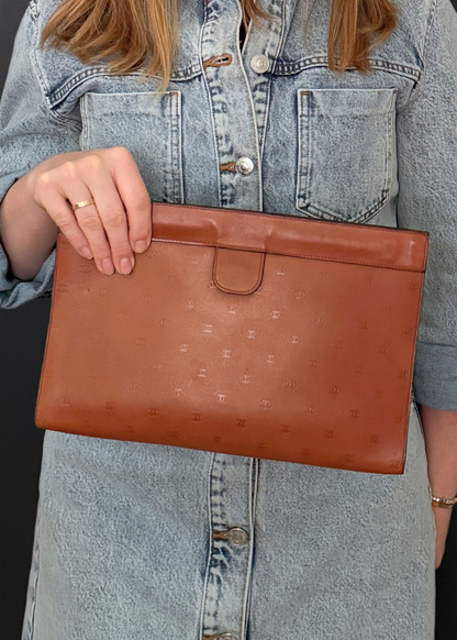 CHANEL CC EMBOSSED CLUTCH