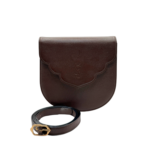 Brown vintage leather Yves Saint Laurent bag with matching strap on a white background
