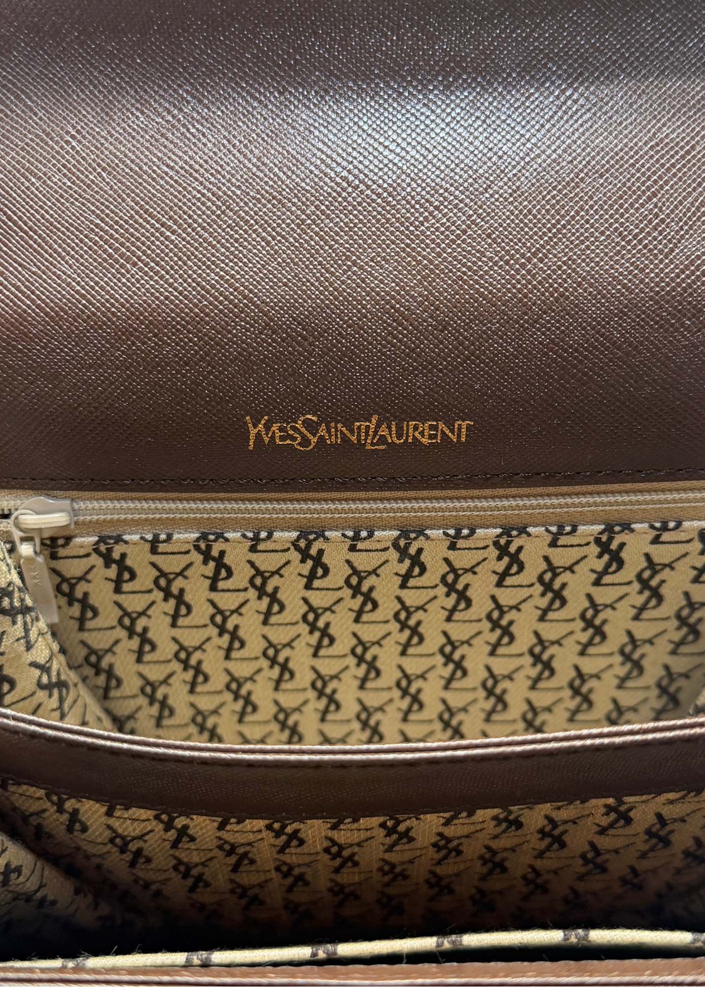Yves Saint Laurent vintage brown leather handbag with flap and visible logo