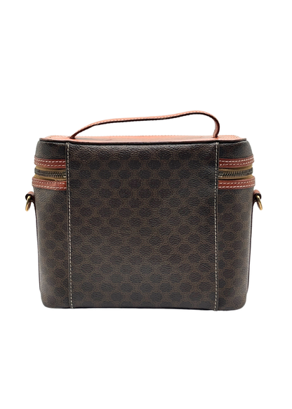 Brown patterned vintage Celine bag with red accents on a white background
