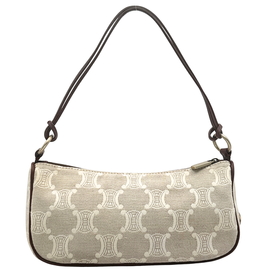 Handbag with a patterned design on a white background
