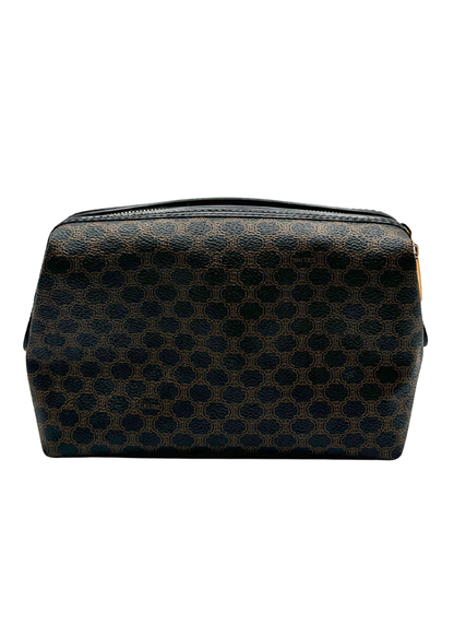 Black patterned Celine toiletry bag on a white background