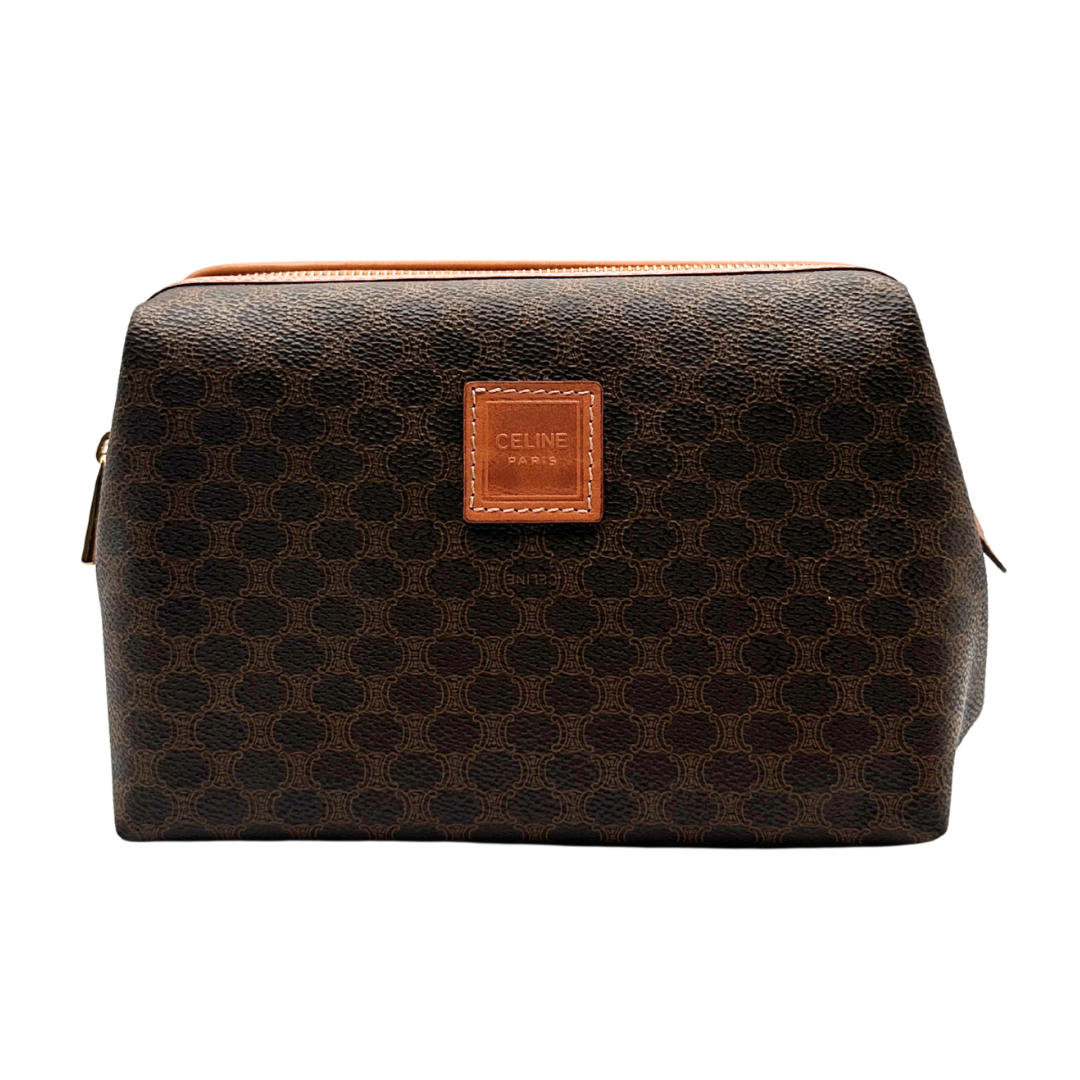 Brown patterned toiletry bag with Celine logo on a white background