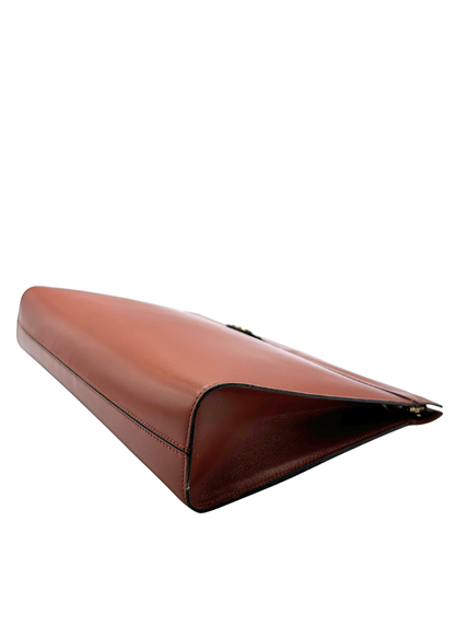 Brown leather handbag on a white background