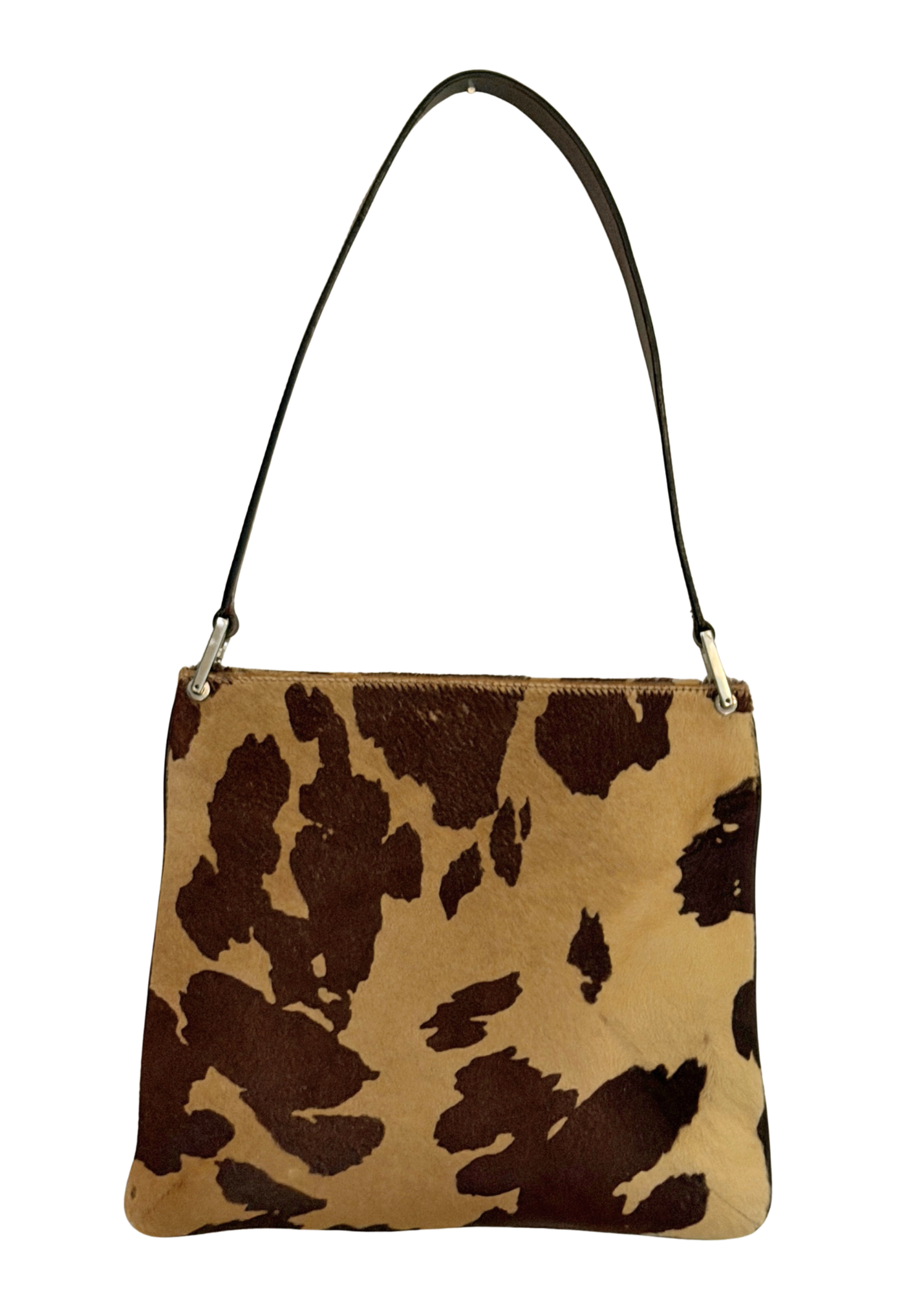 Cow print vintage Fendi handbag with a brown strap on a white background
