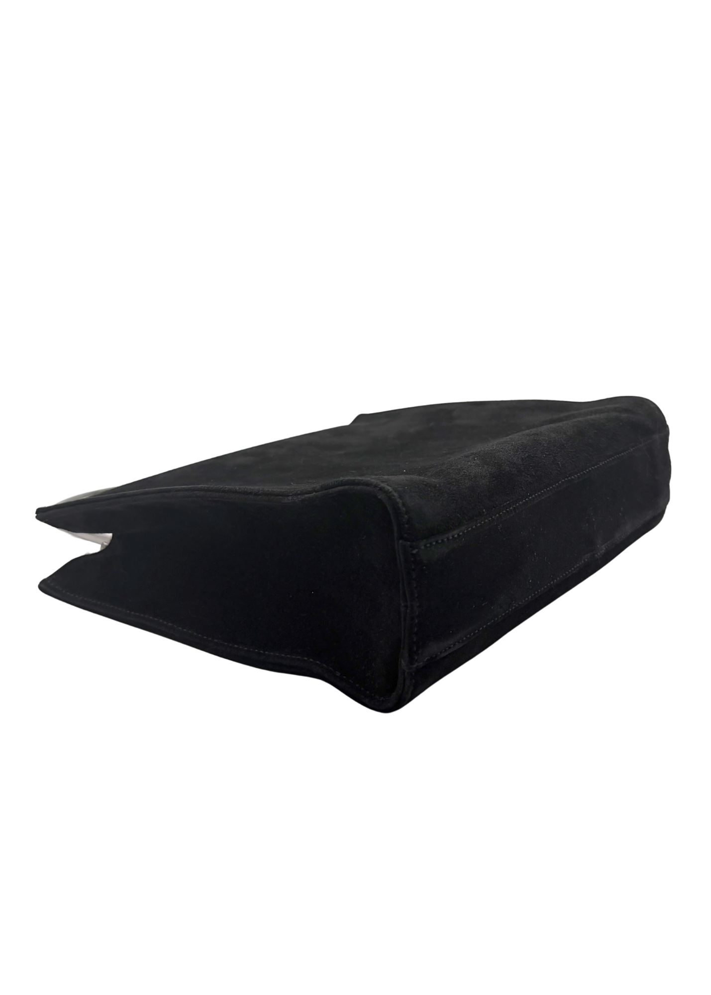 A black suede vintage Gucci bag corner