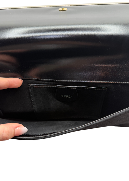 Close up of interior of vintage Gucci ponyhair clutch