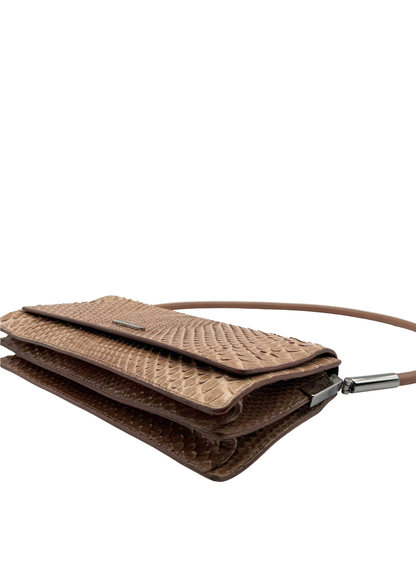 Brown and tan python textured leather Gucci handbag on a white background