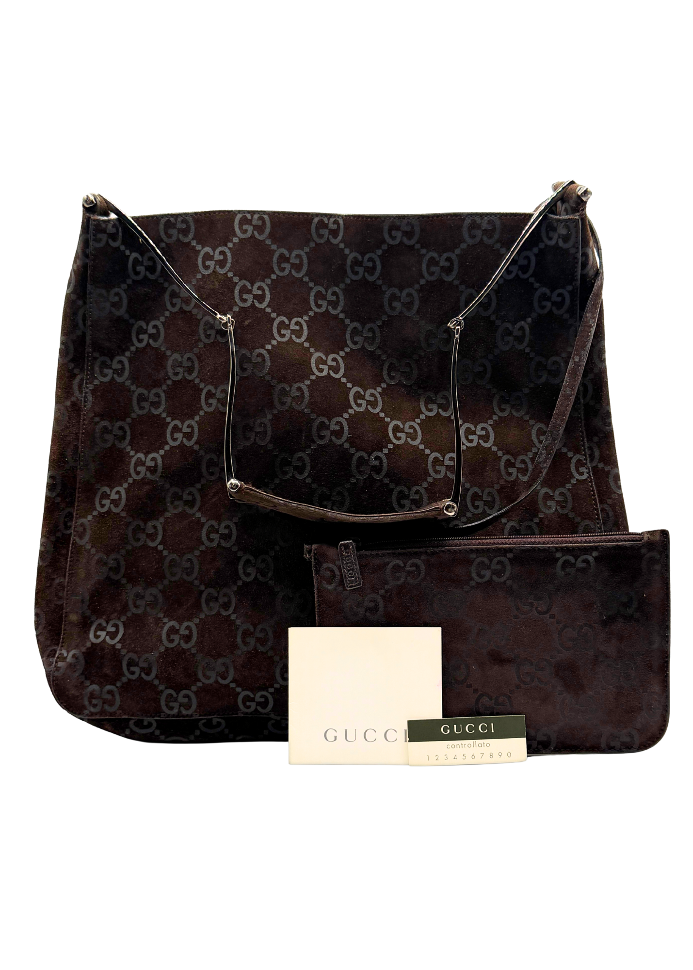 Brown Gucci handbag with matching pouch on a white background