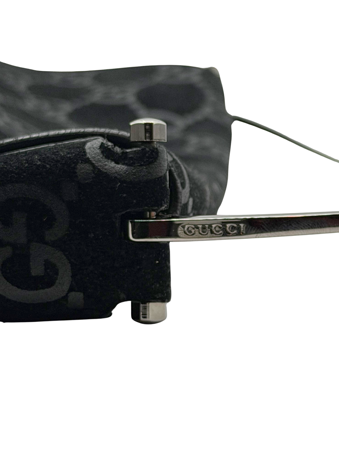 Close-up of a Gucci vintage horsebit bag on a white background