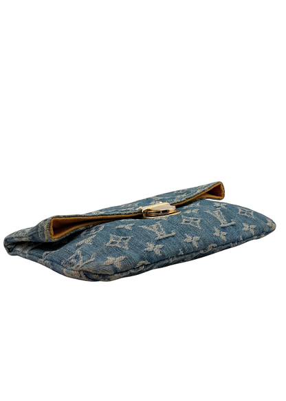 Vintage Louis Vuitton denim blue patterned clutch bag on a white background