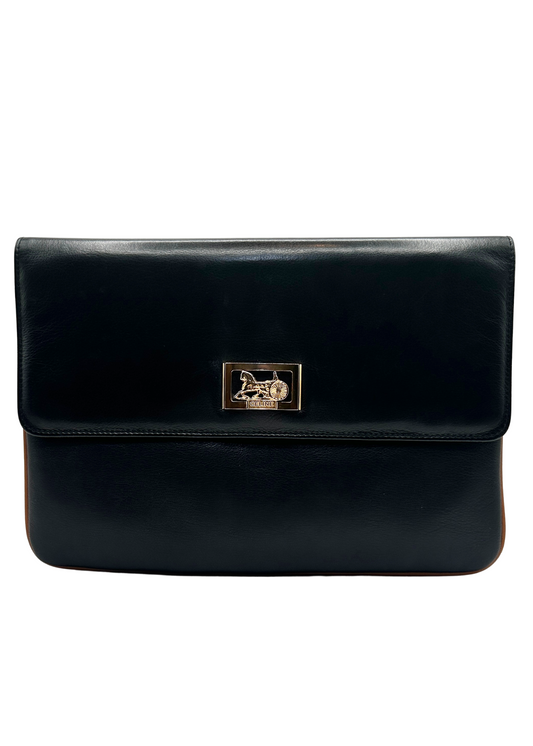 Black Celine leather clutch bag with a gold clasp on a white background