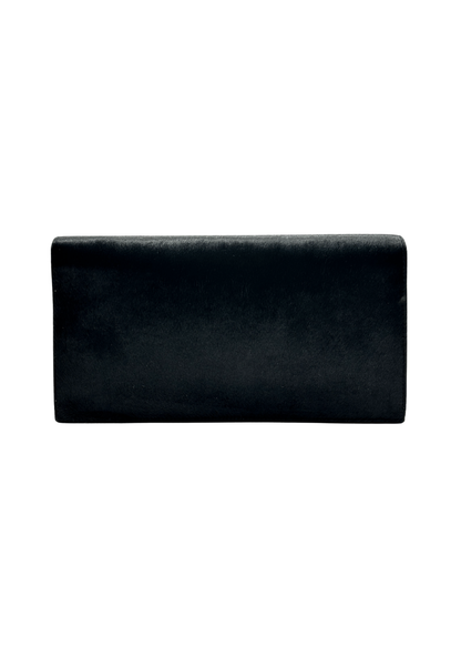 Black Gucci ponyhair clutch bag on a white background