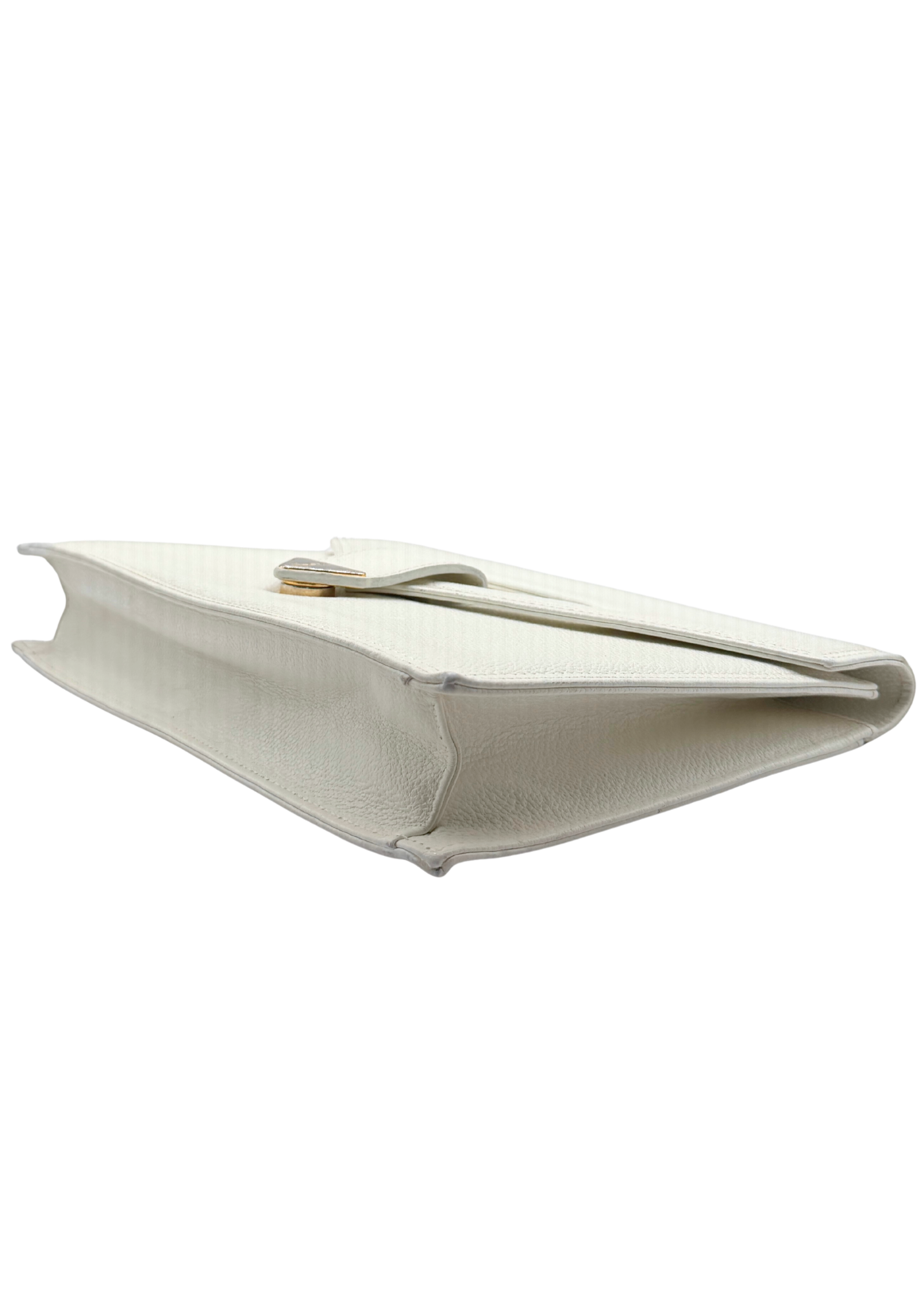 White vintage Yves Saint Laurent clutch bag on a white background