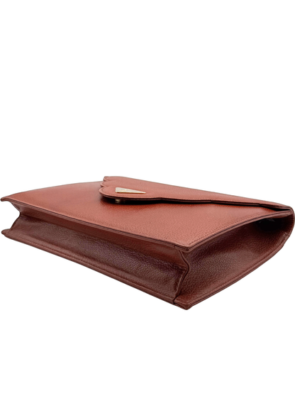 Brown vintage pebbled leather YSL  clutch bag on a white background