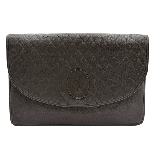 A dark gray brown quilted leather clutch bag with a diagonal split flap and a central embossed YSL logo, shown against a plain white background.