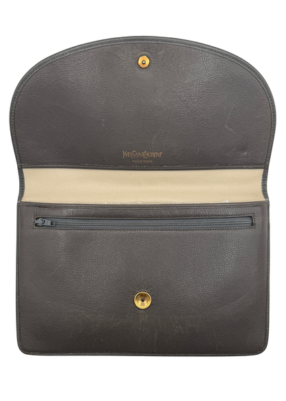 A vintage chocolate taupe leather clutch that is open showing the interior pouch and zipper