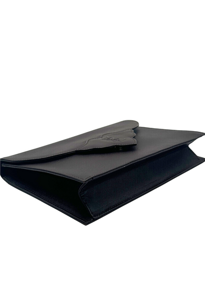 Brown YSL clutch corner